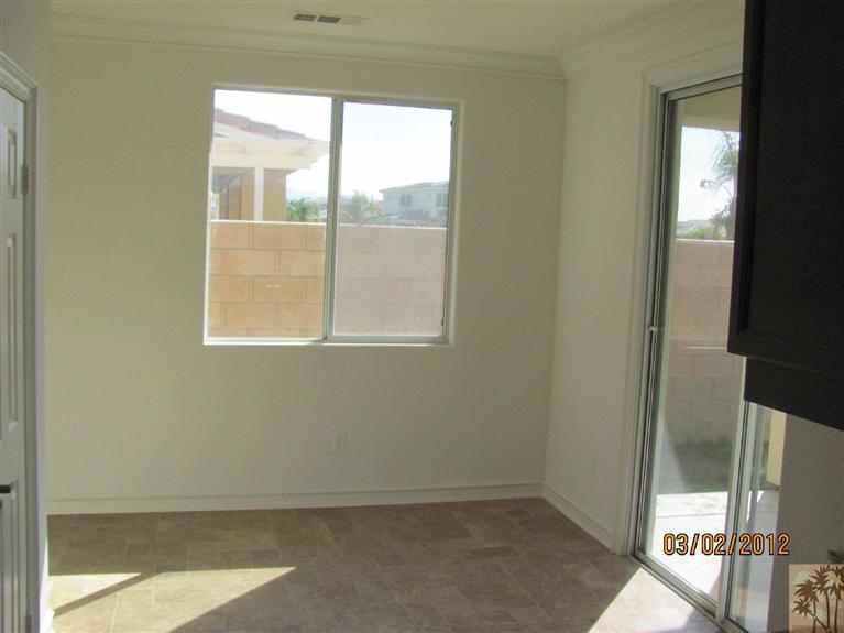 83329 Stagecoach Road Indio, CA 92203 - Photo 6 of 10 a view of an empty room with a window