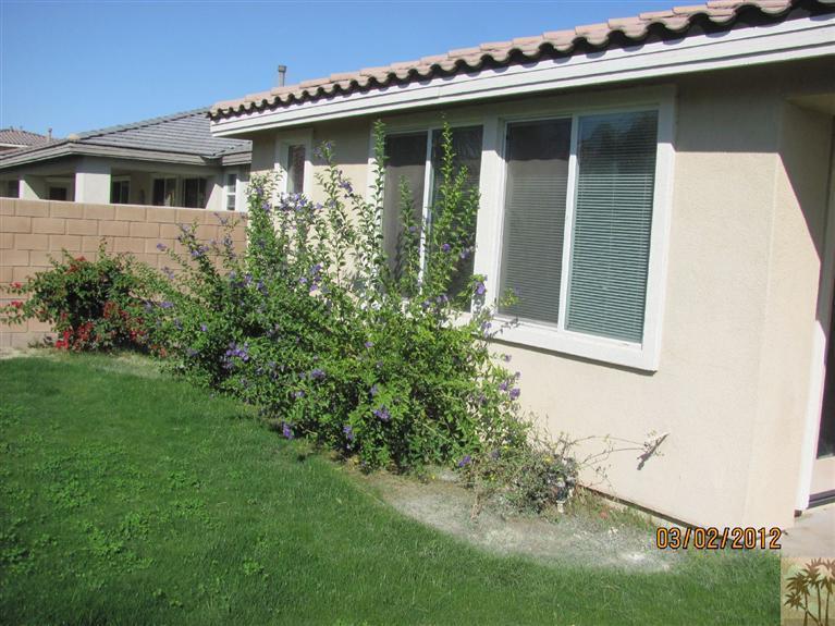 83329 Stagecoach Road Indio, CA 92203 - Photo 8 of 10 a front view of a house with garden