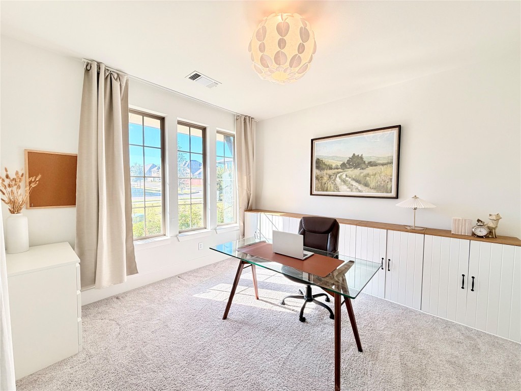 2012 Bayridge Road Georgetown, TX 78628 - Photo 14 of 32 a workspace with furniture and a window