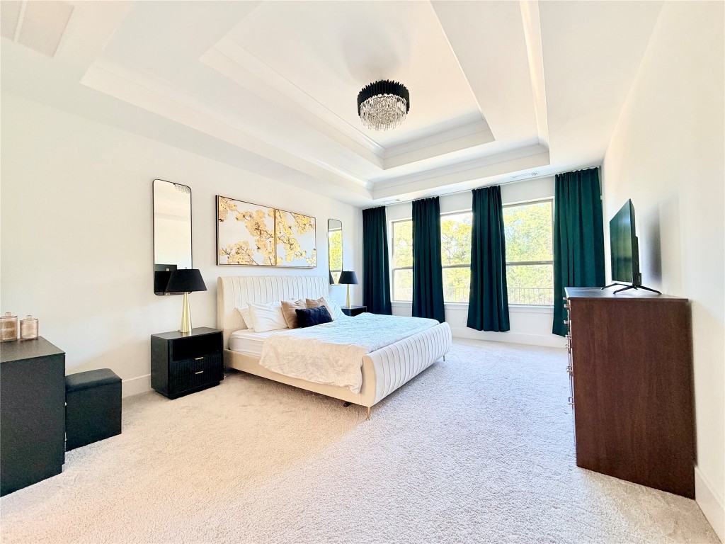 2012 Bayridge Road Georgetown, TX 78628 - Photo 17 of 32 a bedroom with a large bed and a large window