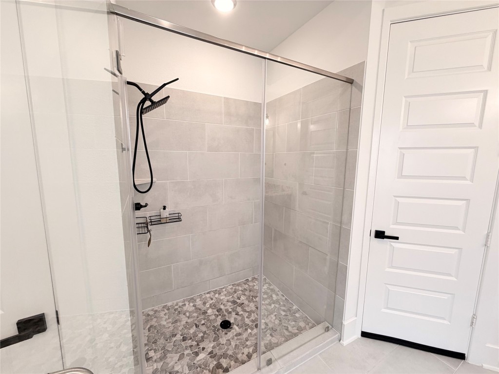 2012 Bayridge Road Georgetown, TX 78628 - Photo 19 of 32 a bathroom with a shower