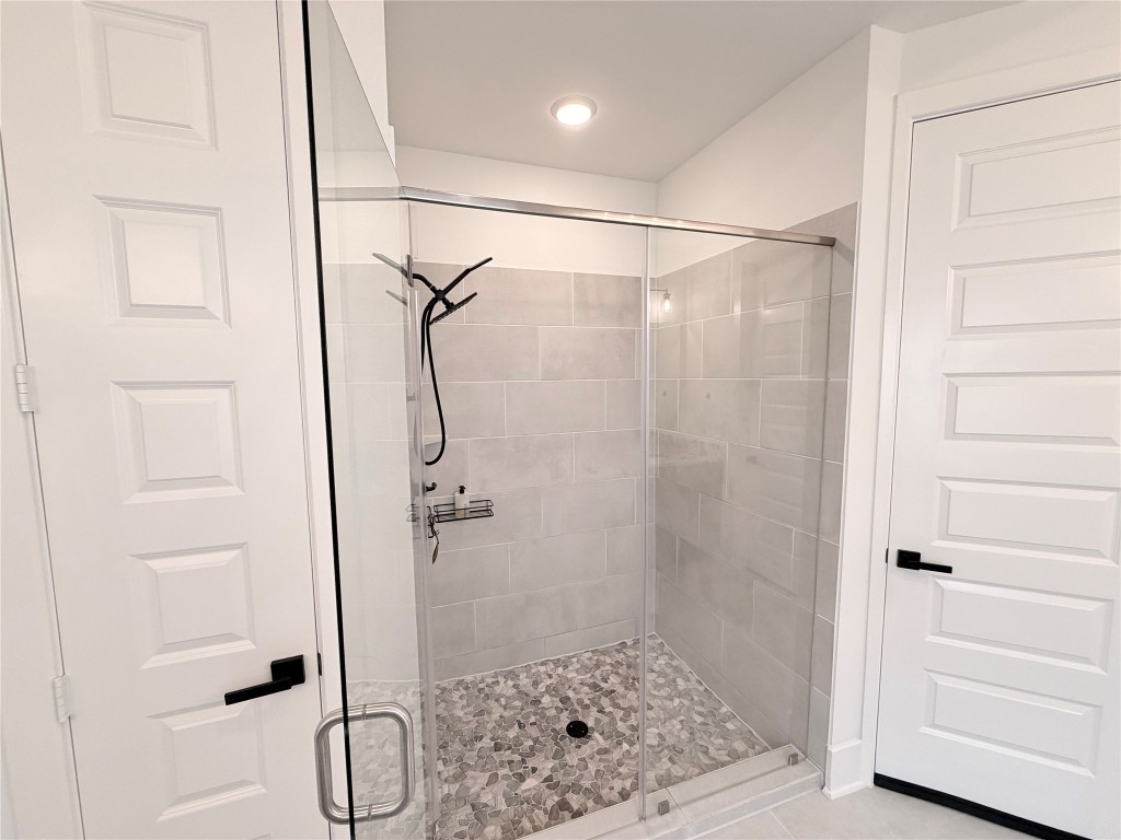 2012 Bayridge Road Georgetown, TX 78628 - Photo 20 of 32 a bathroom with a shower