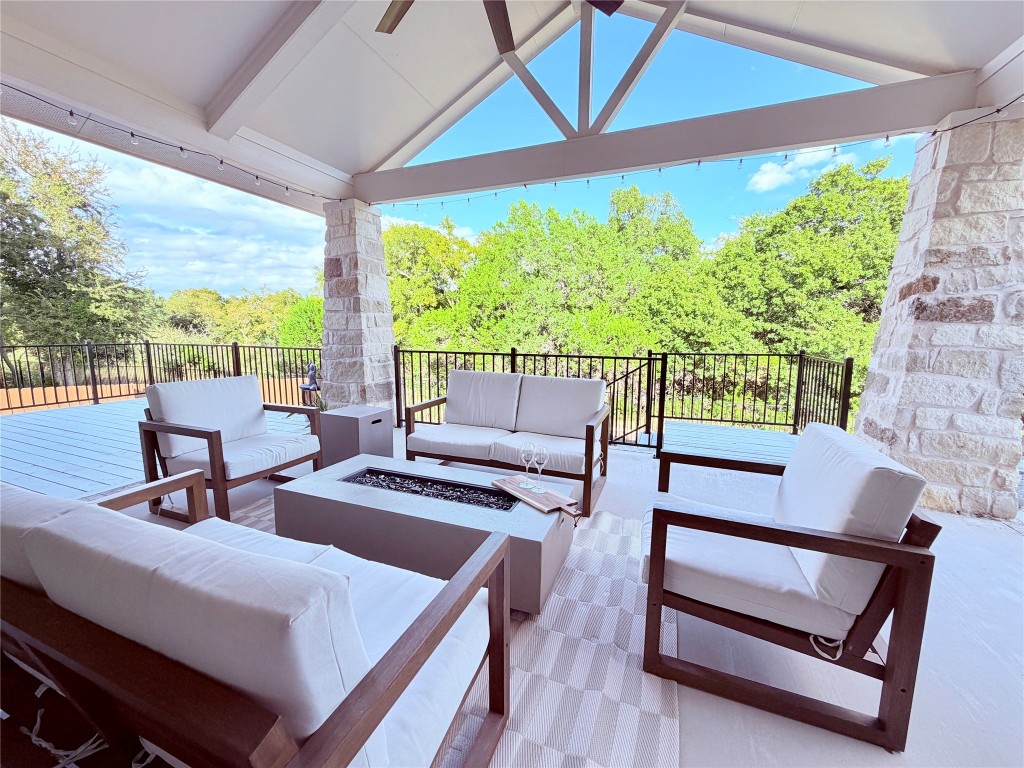 2012 Bayridge Road Georgetown, TX 78628 - Photo 27 of 32 a living room with furniture and a floor to ceiling window