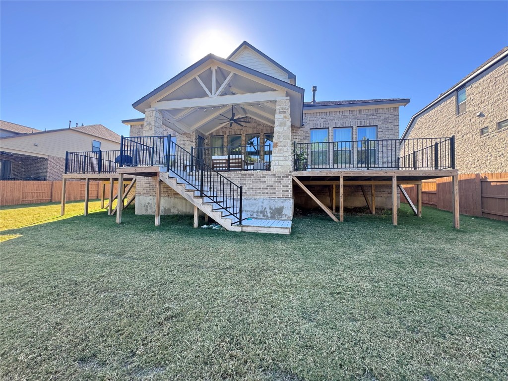 2012 Bayridge Road Georgetown, TX 78628 - Photo 28 of 32 a view of a house with a yard