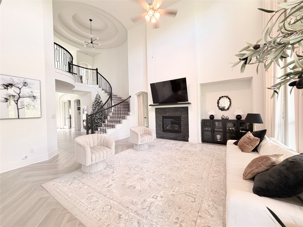 2012 Bayridge Road Georgetown, TX 78628 - Photo 3 of 32 a living room with furniture and a flat screen tv