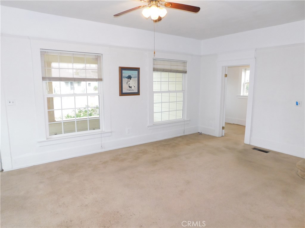 2626 5th Street Riverside, CA 92507 - Photo 11 of 31 an empty room with windows and closet