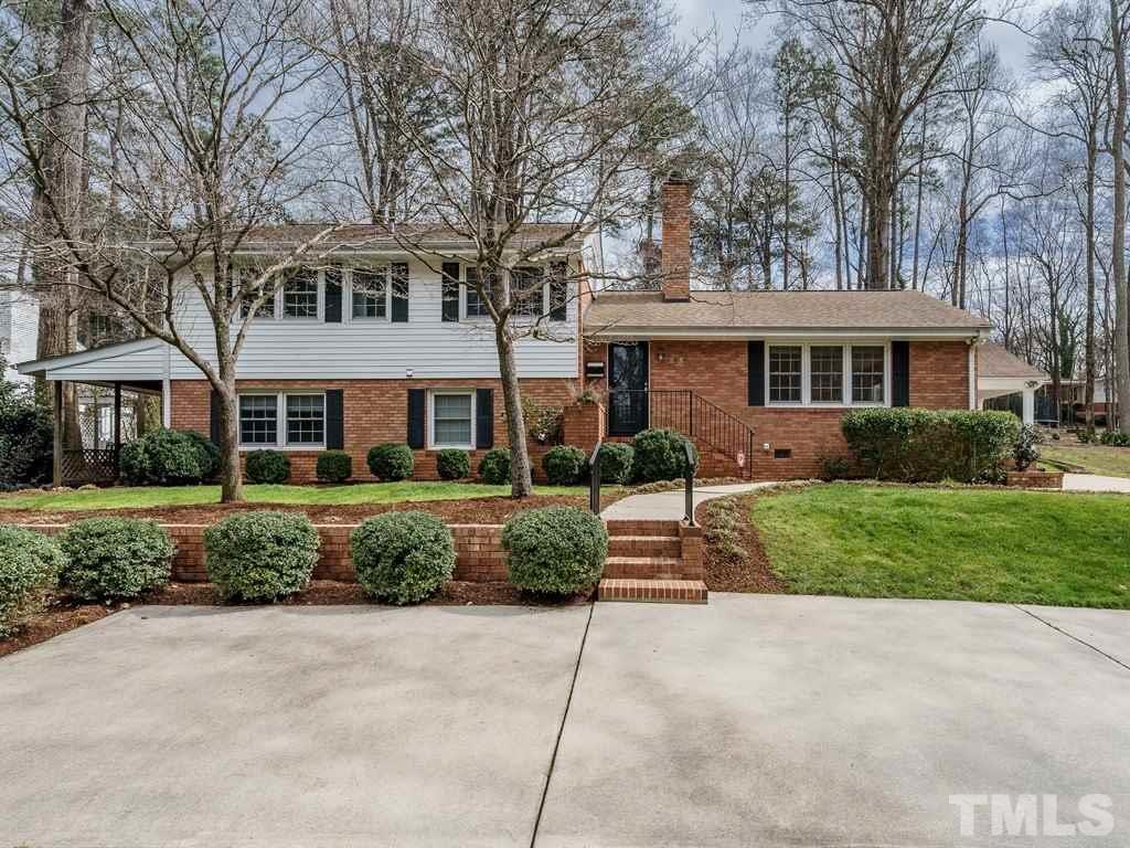 2456 Oxford Road Raleigh, NC 27608 - Photo 1 of 30 front view of a house with a yard