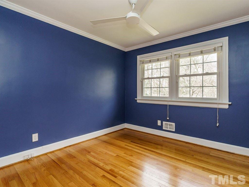 2456 Oxford Road Raleigh, NC 27608 - Photo 16 of 30 a view of an empty room with a window