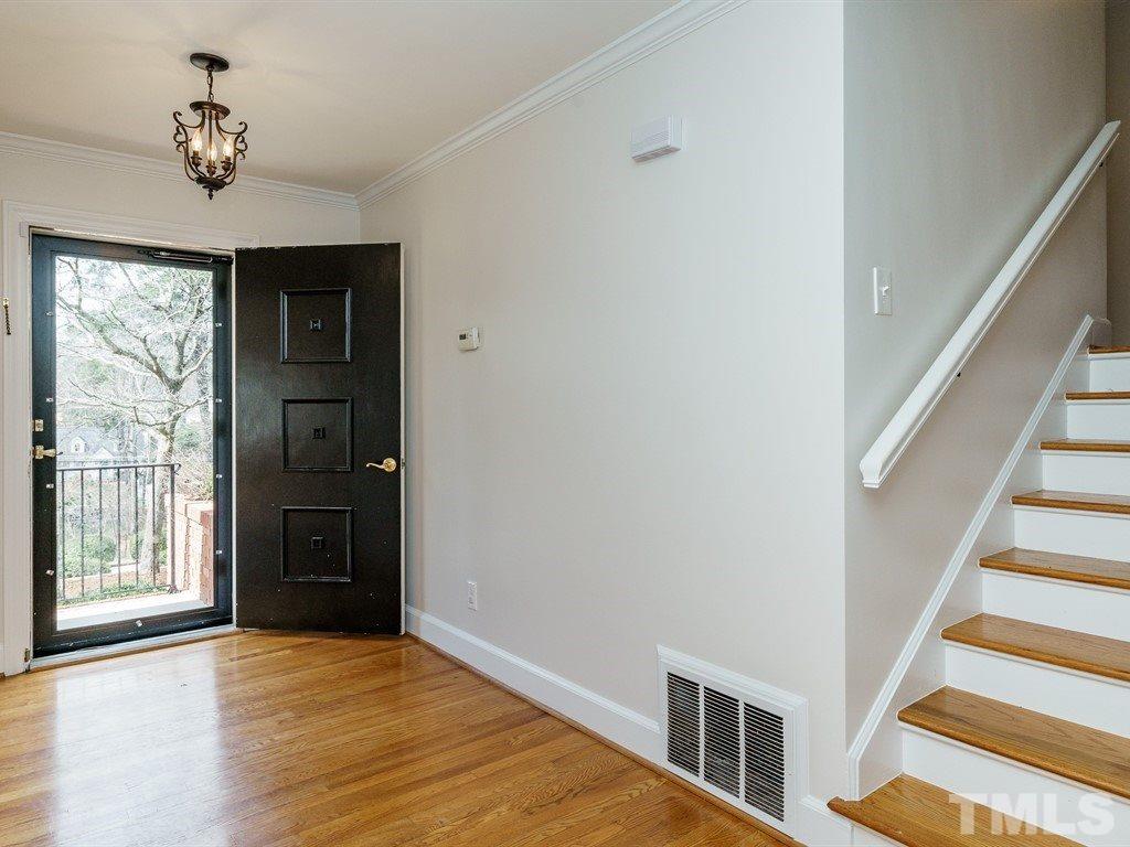 2456 Oxford Road Raleigh, NC 27608 - Photo 3 of 30 a view of an entryway with wooden floor