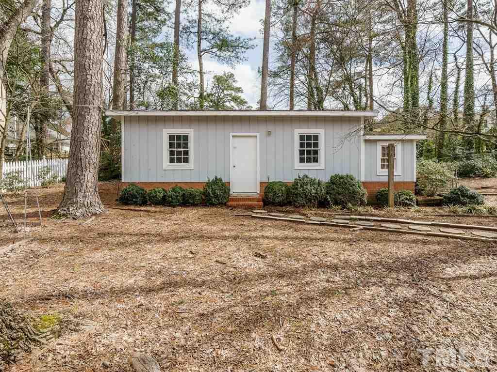2456 Oxford Road Raleigh, NC 27608 - Photo 26 of 30 front view of a house with a yard