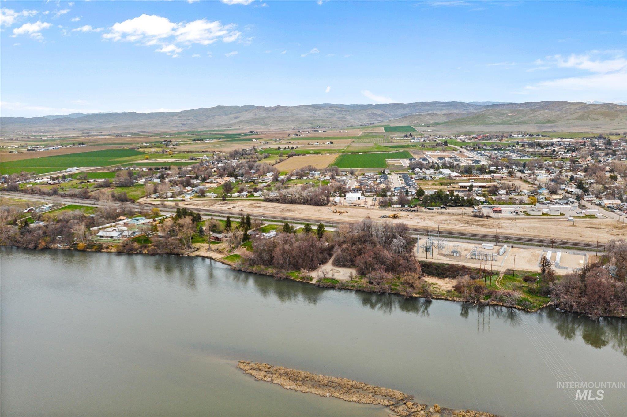 1065 West 11th Street Weiser, ID 83672 - Photo 4 of 48 Drone / aerial view of a mountain backdrop