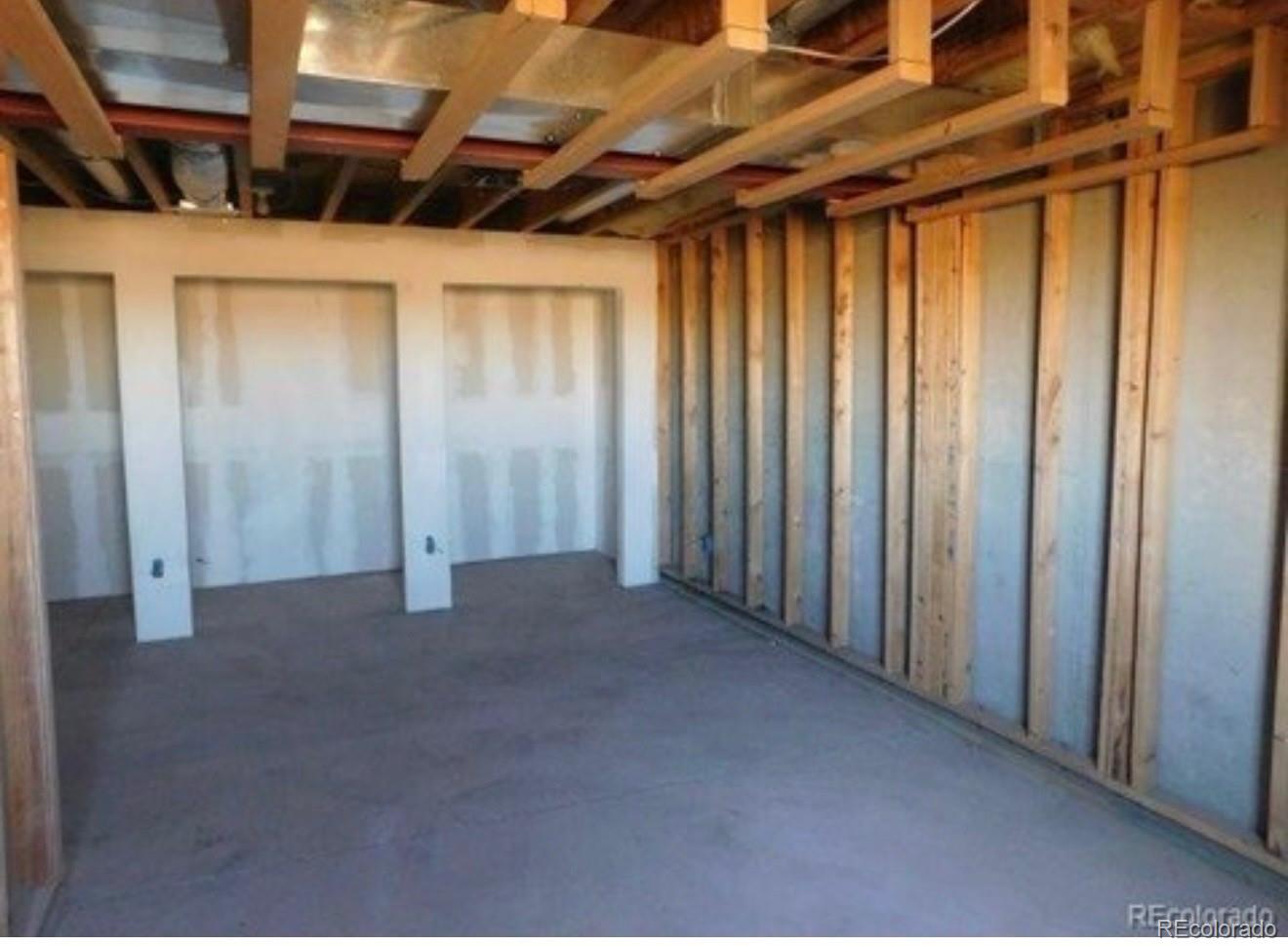38423 County Road 166 Agate, CO 80101 - Photo 12 of 28 a view of a room with wooden walls