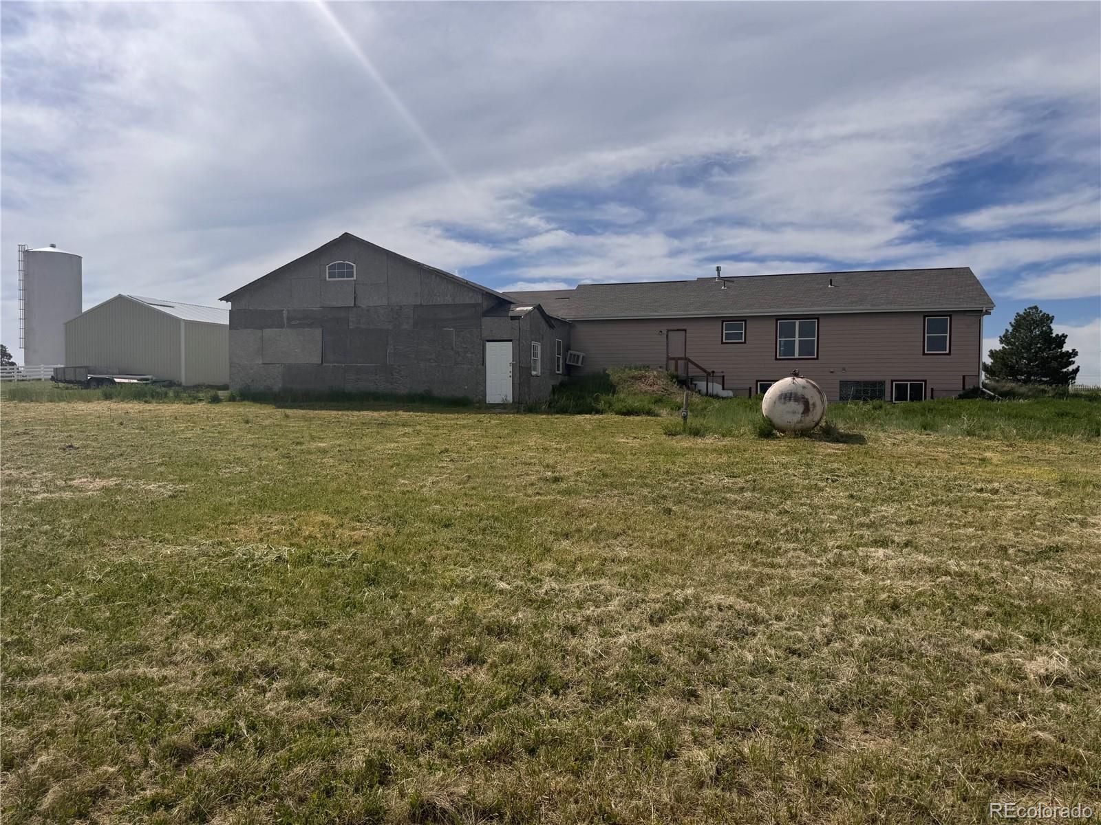 38423 County Road 166 Agate, CO 80101 - Photo 19 of 28 a view of a house with a yard