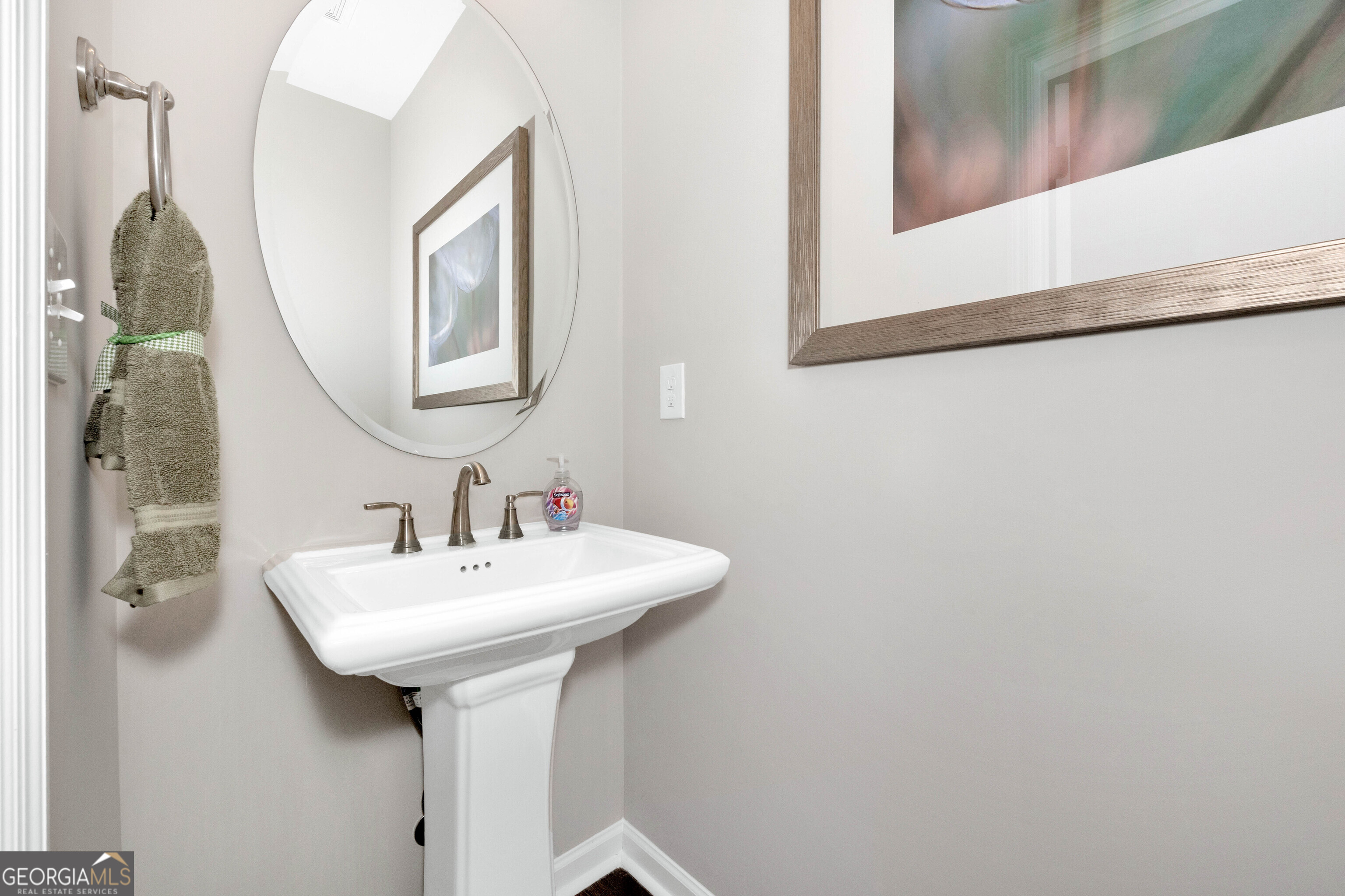 200 Ivy Glen Drive Perry, GA 31069 - Photo 11 of 13 a bathroom with a sink and mirror