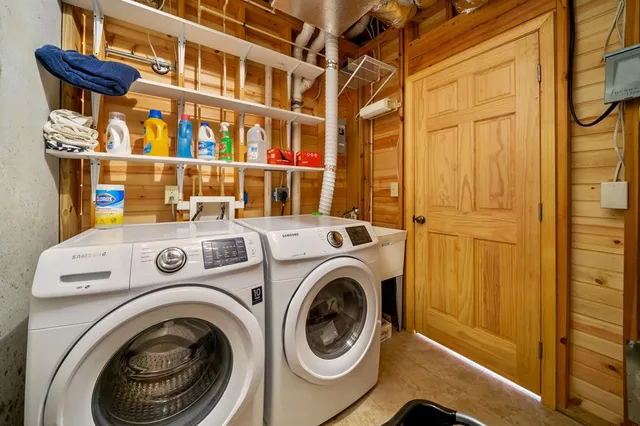 a utility room with dryer and washer