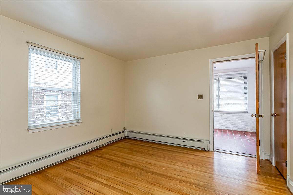 2702 Alden Road Baltimore, MD 21234 - Photo 19 of 34 Main floor family into 3 season space