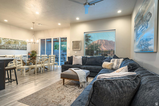 2600 Ocotillo Way, Unit 31 Santa Clara, UT 84765 - Photo 5 of 73 Open-concept living space featuring wood-finish flooring, recessed lighting, and a modern ceiling fan