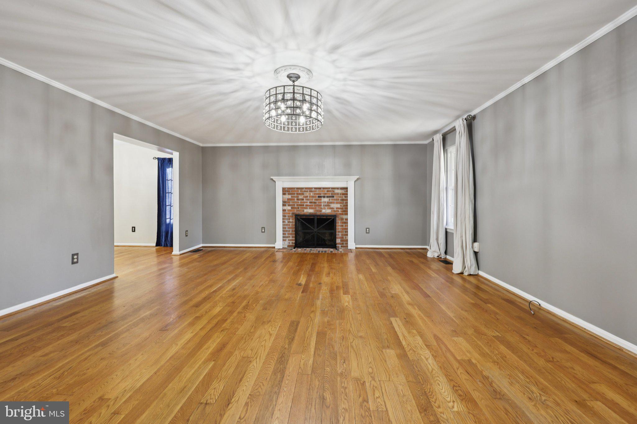 13445 Blackwells Mill Road Goldvein, VA 22720 - Photo 15 of 95 wooden floor in an empty room with a window