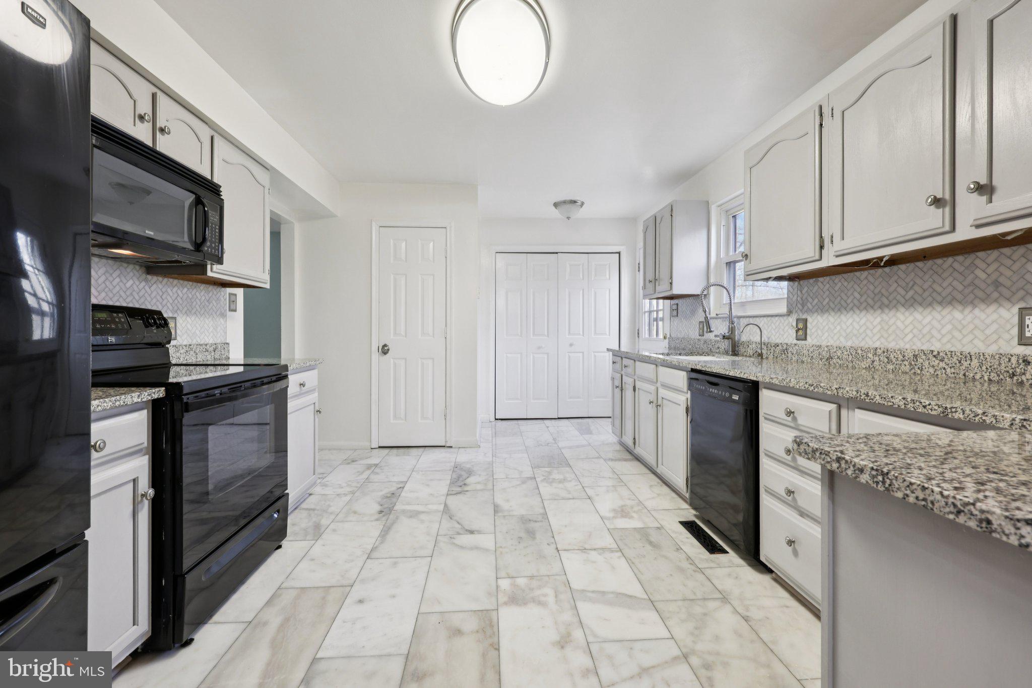 13445 Blackwells Mill Road Goldvein, VA 22720 - Photo 22 of 95 Updated kitchen with marble tile floors