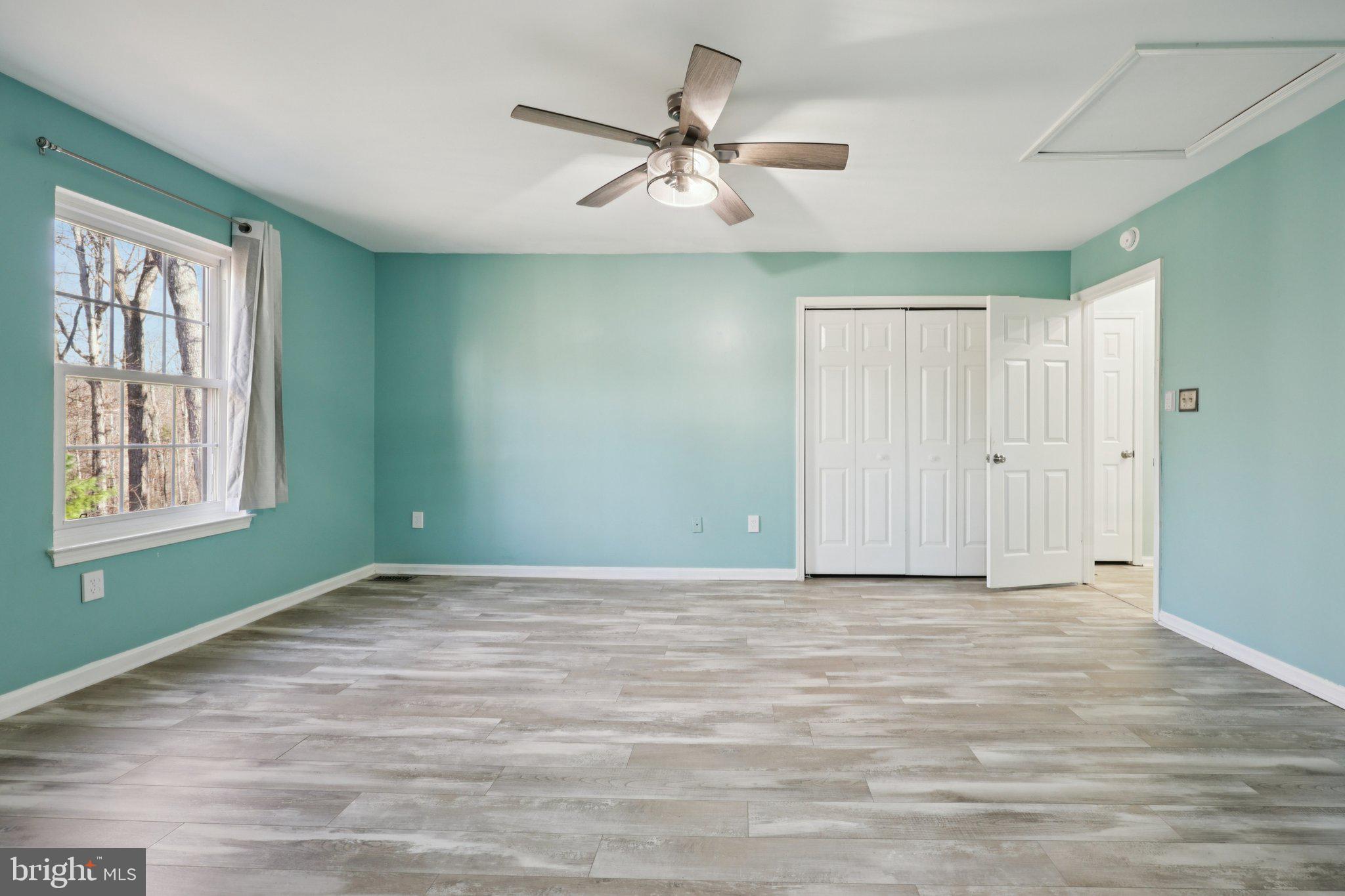 13445 Blackwells Mill Road Goldvein, VA 22720 - Photo 41 of 95 a view of an empty room with a window