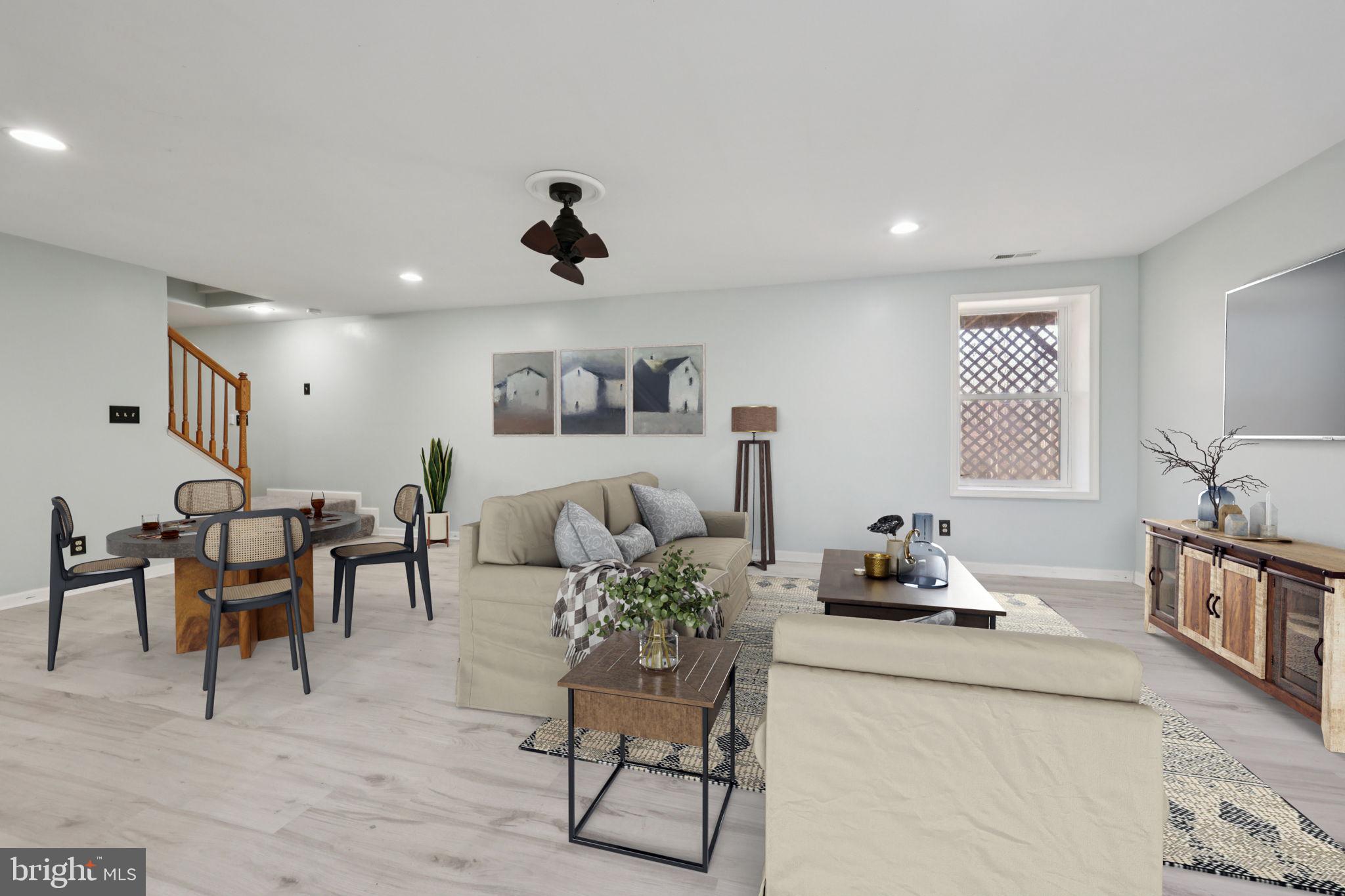 13445 Blackwells Mill Road Goldvein, VA 22720 - Photo 47 of 95 a living room with furniture potted plant and a window