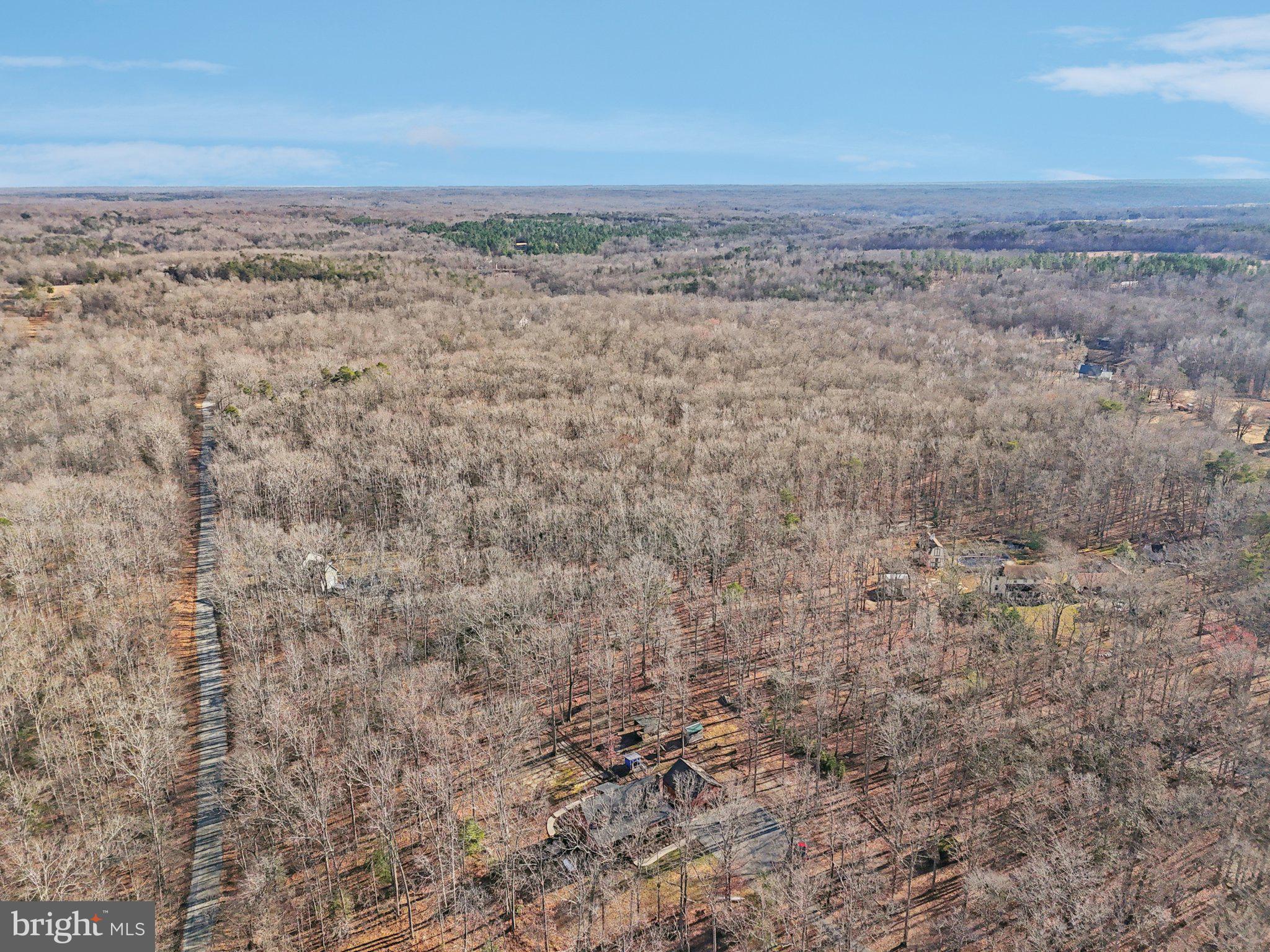 13445 Blackwells Mill Road Goldvein, VA 22720 - Photo 74 of 95 a view of a dry yard with wooden floor and fence
