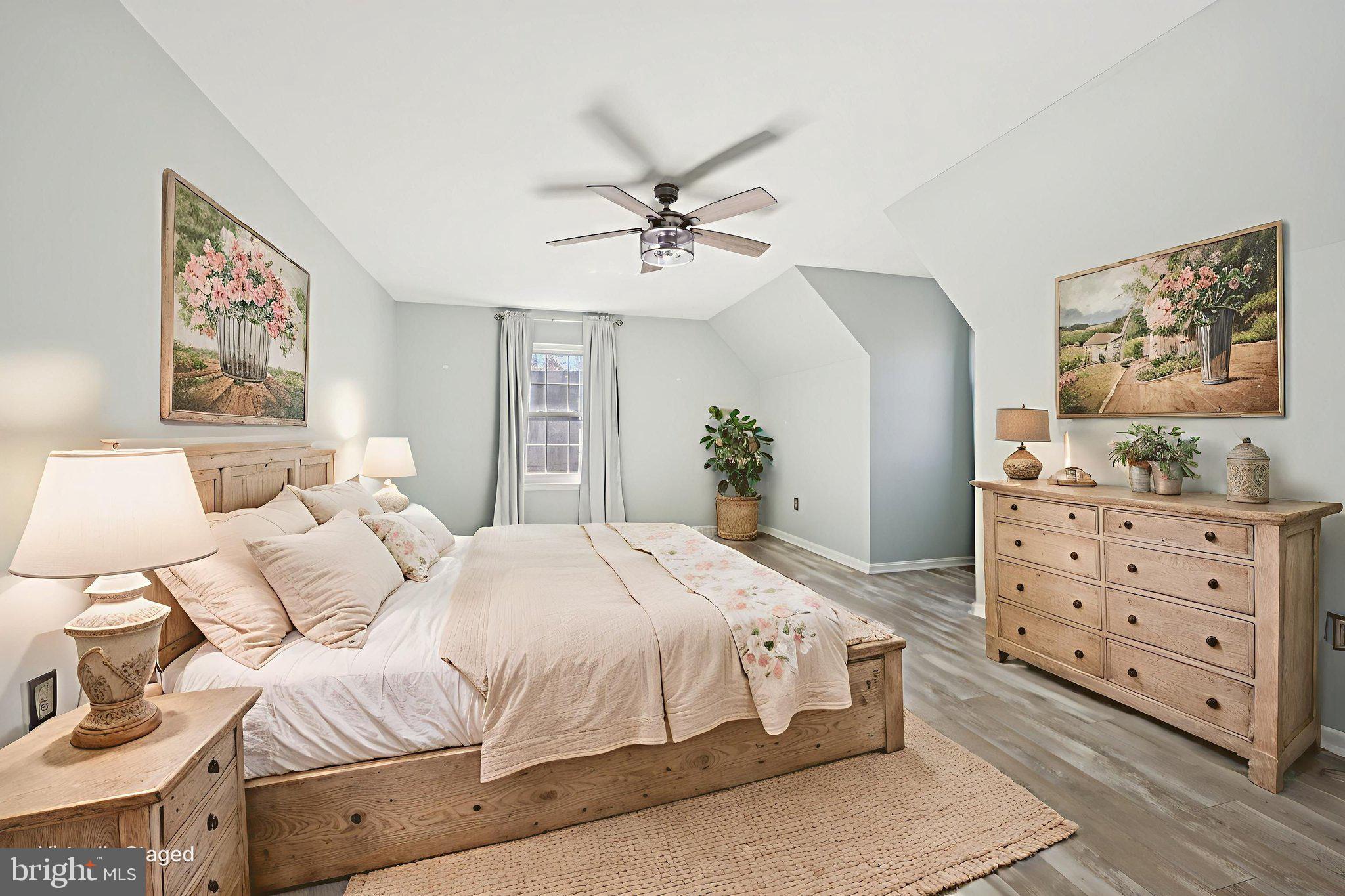 13445 Blackwells Mill Road Goldvein, VA 22720 - Photo 9 of 95 a bedroom with a bed and painting on the wall