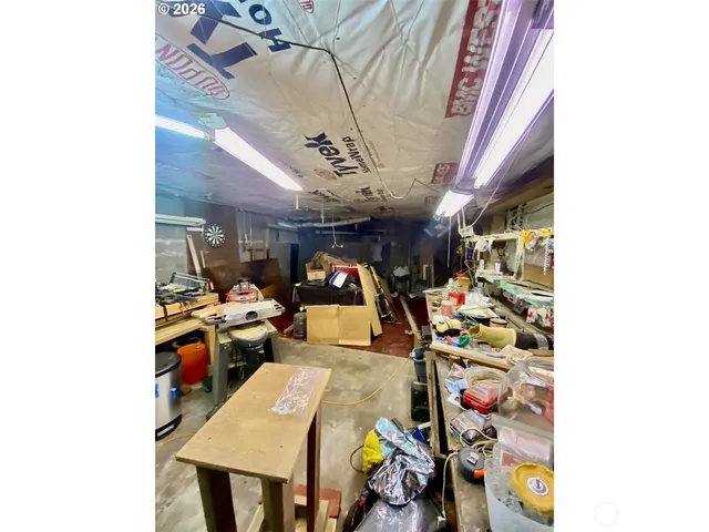 a view of a workspace with furniture