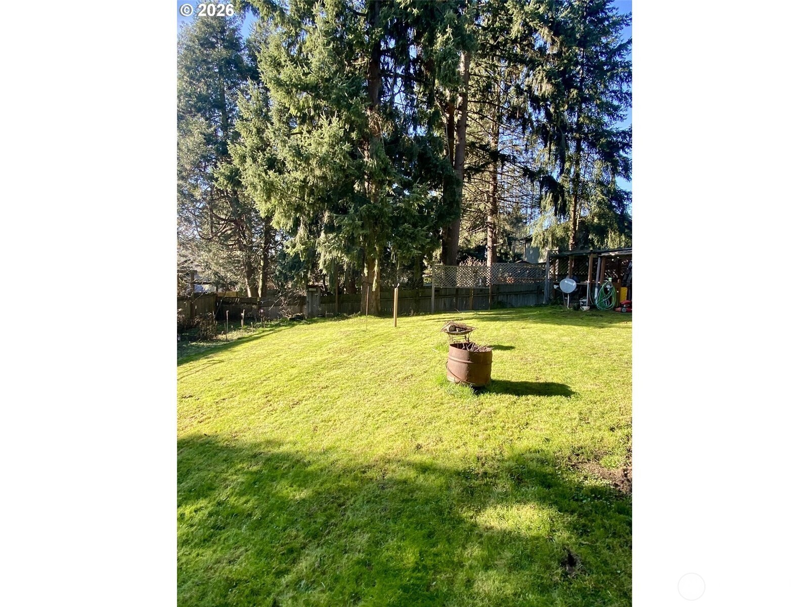 101 Northwest 107th Street Vancouver, WA 98685 - Photo 19 of 27 a swimming pool with some trees in the background