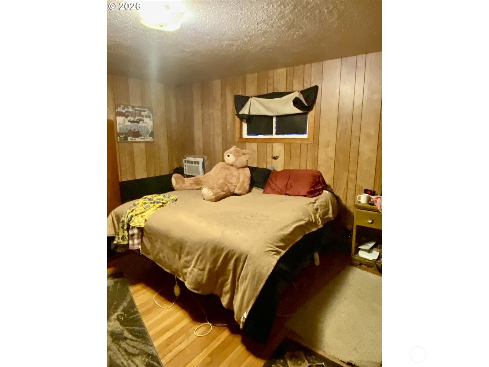 101 Northwest 107th Street Vancouver, WA 98685 - Photo 10 of 27 a bedroom with a bed and a window