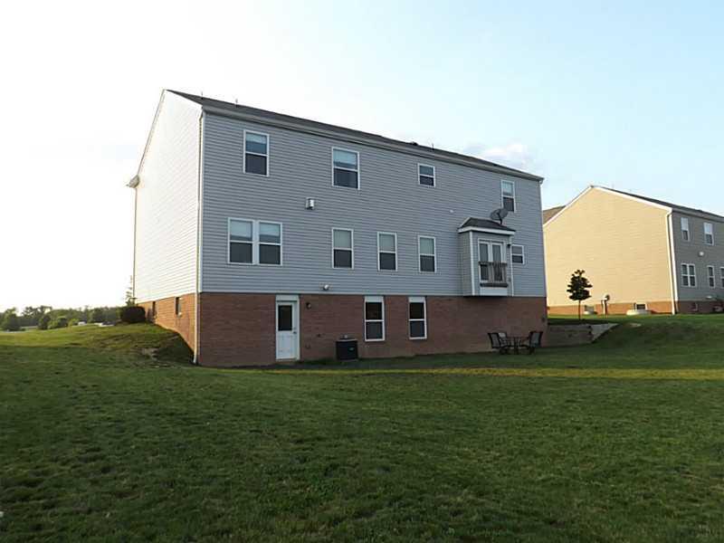 116 Stallion Road Clinton, PA 15026 - Photo 25 of 25 Exterior Back. Walk-out Basement to huge Level Lot!