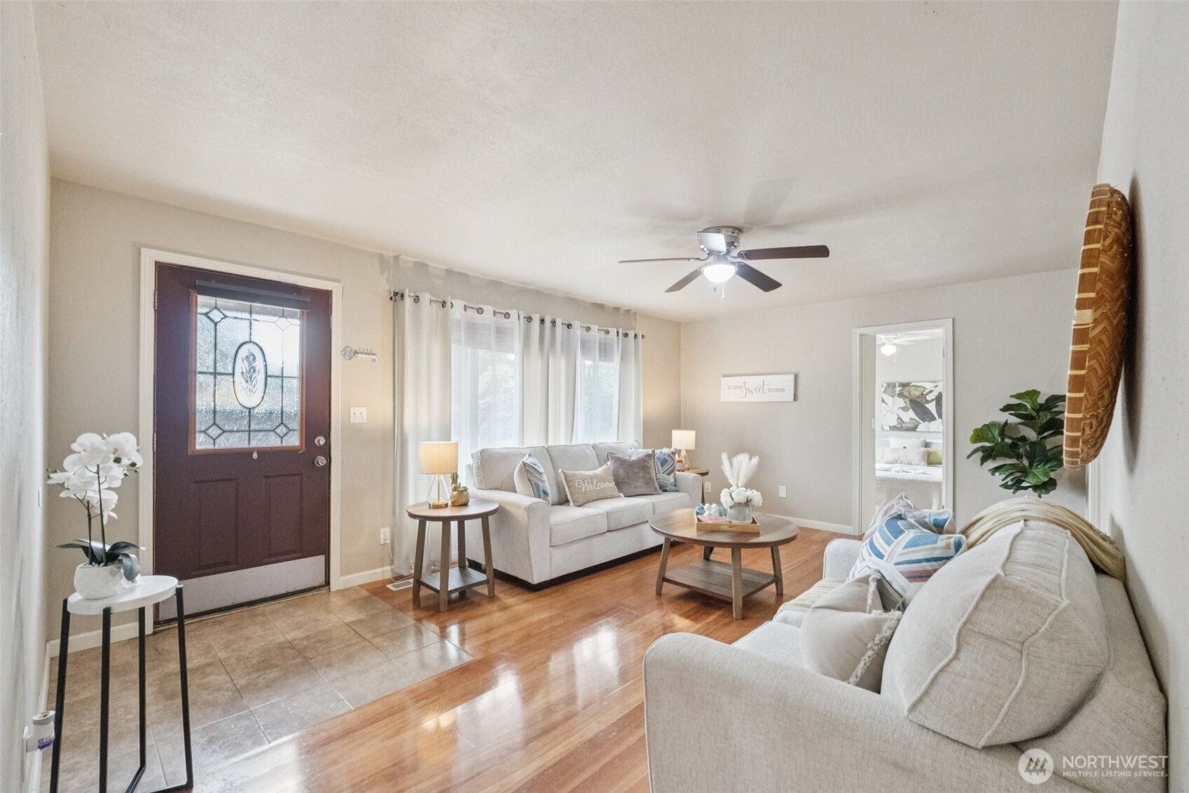 8211 Custer Road Southwest Lakewood, WA 98499 - Photo 5 of 26 a living room with furniture and a large window