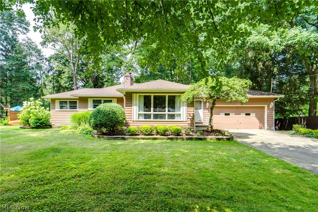 3799 Boydell Road Kent, OH 44240 - Photo 1 of 21 Ranch-style house featuring a garage and a front lawn