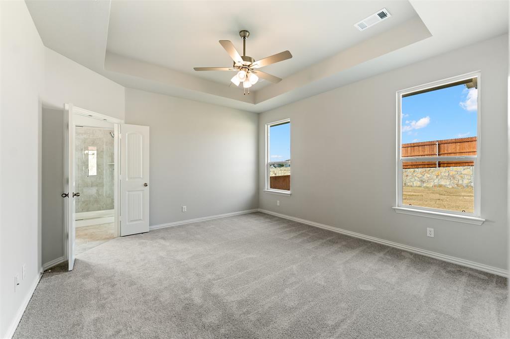 541 Mitchell Boulevard Weatherford, TX 76087 - Photo 11 of 30 a view of an empty room with a window