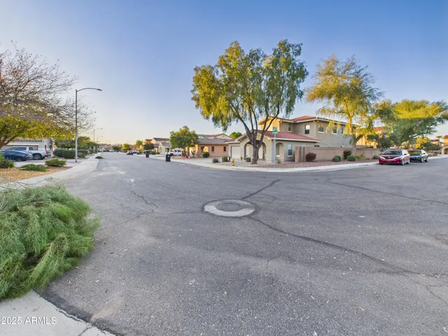 a view of a street with cars