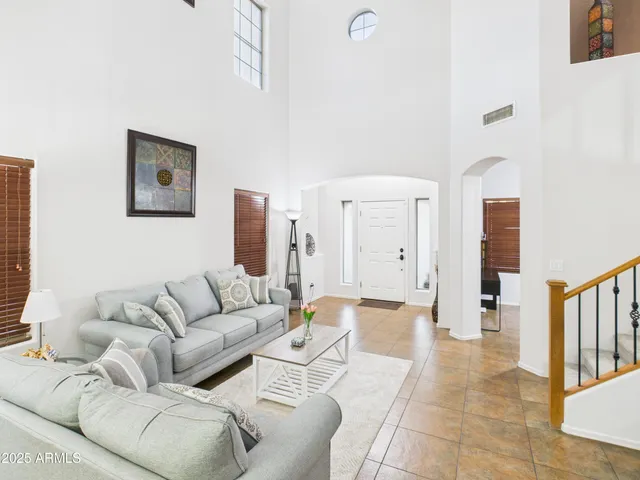 a living room with furniture and a couch