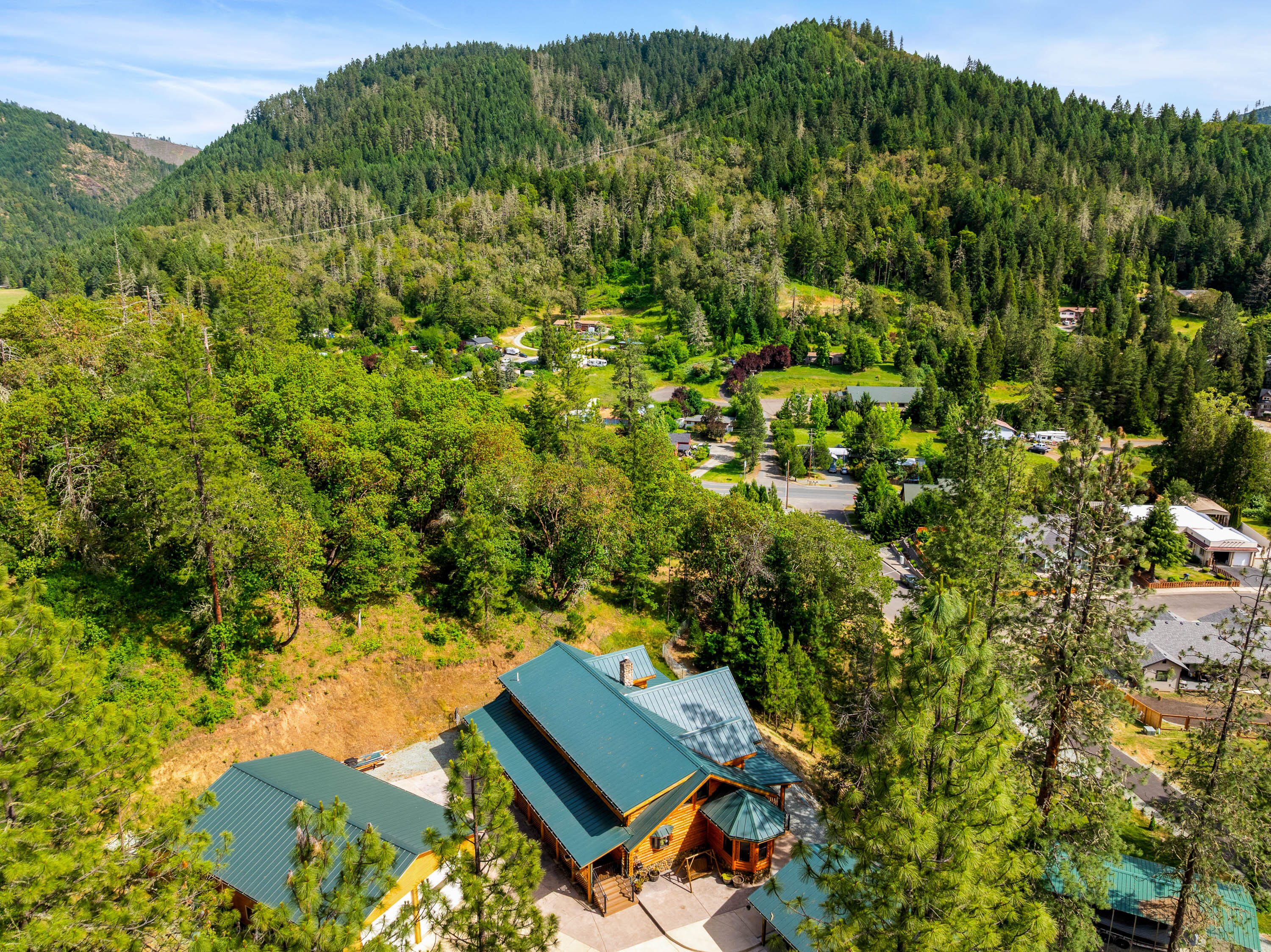225 Eagle Ridge Road Canyonville, OR 97417 - Photo 6 of 52 an aerial view of a house with a yard