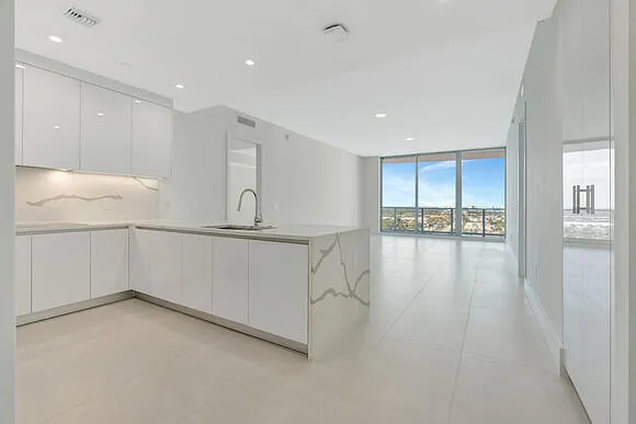 a view of a kitchen with a sink
