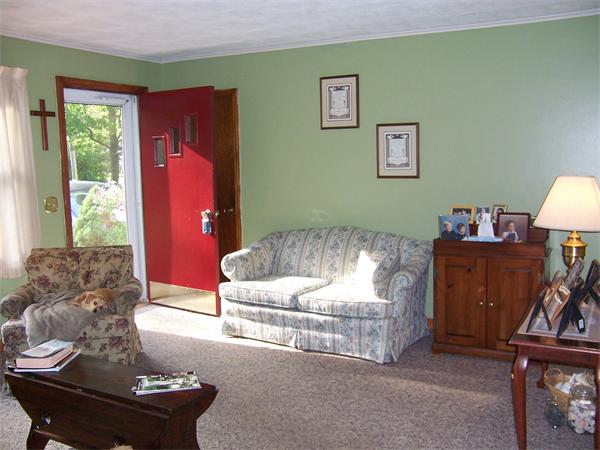 93 Ponakin Road Lancaster, MA 01523 - Photo 3 of 24 a living room with furniture and a window