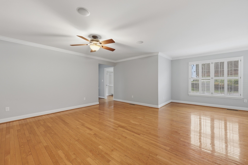35 Peter Street Holliston, MA 01746 - Photo 20 of 42 a view of an empty room with window and wooden floor