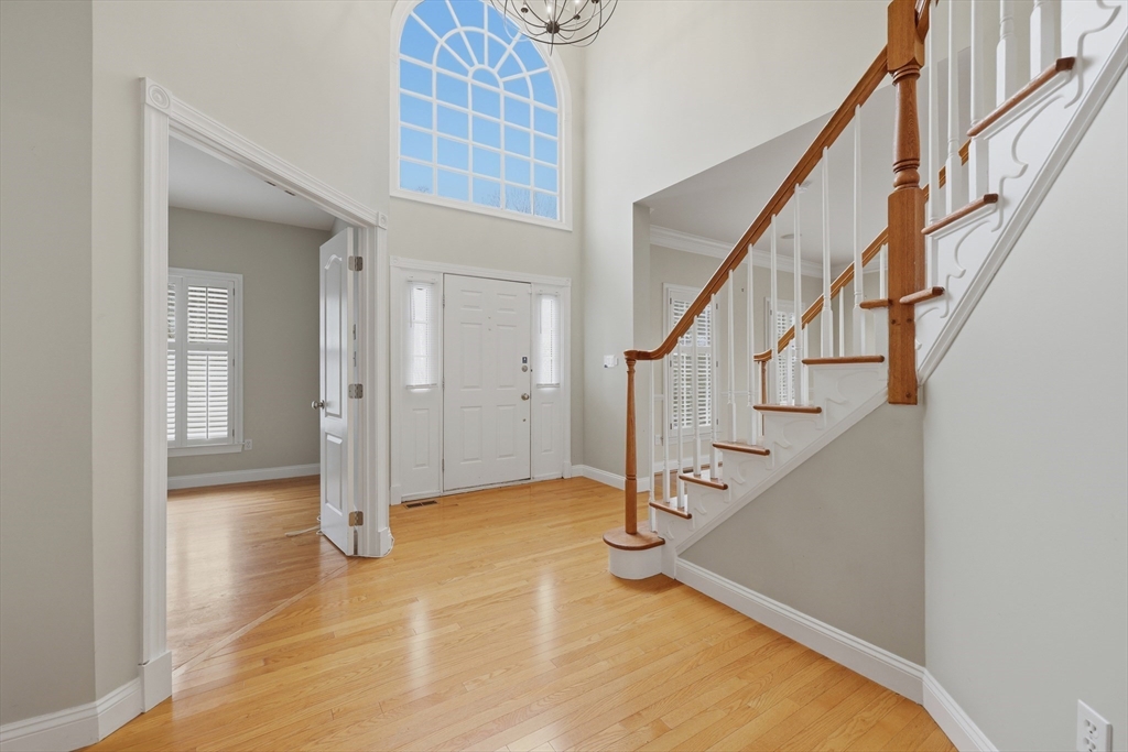 35 Peter Street Holliston, MA 01746 - Photo 3 of 42 a view of an entryway with staircase