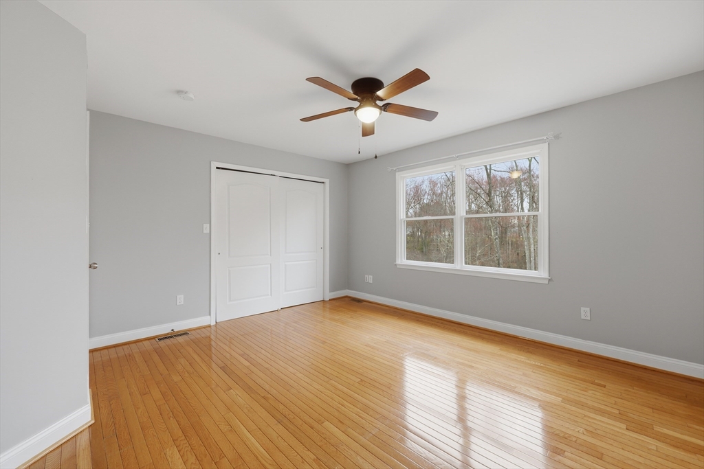 35 Peter Street Holliston, MA 01746 - Photo 34 of 42 a view of an empty room with a window