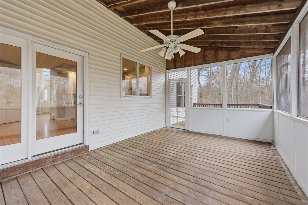 35 Peter Street Holliston, MA 01746 - Photo 38 of 42 a view of an empty room with wooden floor and a window