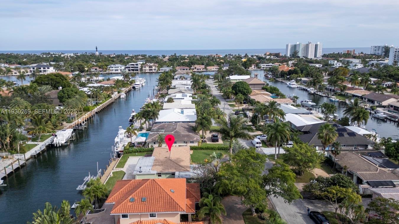 2875 Northeast 19th Street Pompano Beach, FL 33062 - Photo 21 of 79 an aerial view of residential houses with outdoor space and lake view