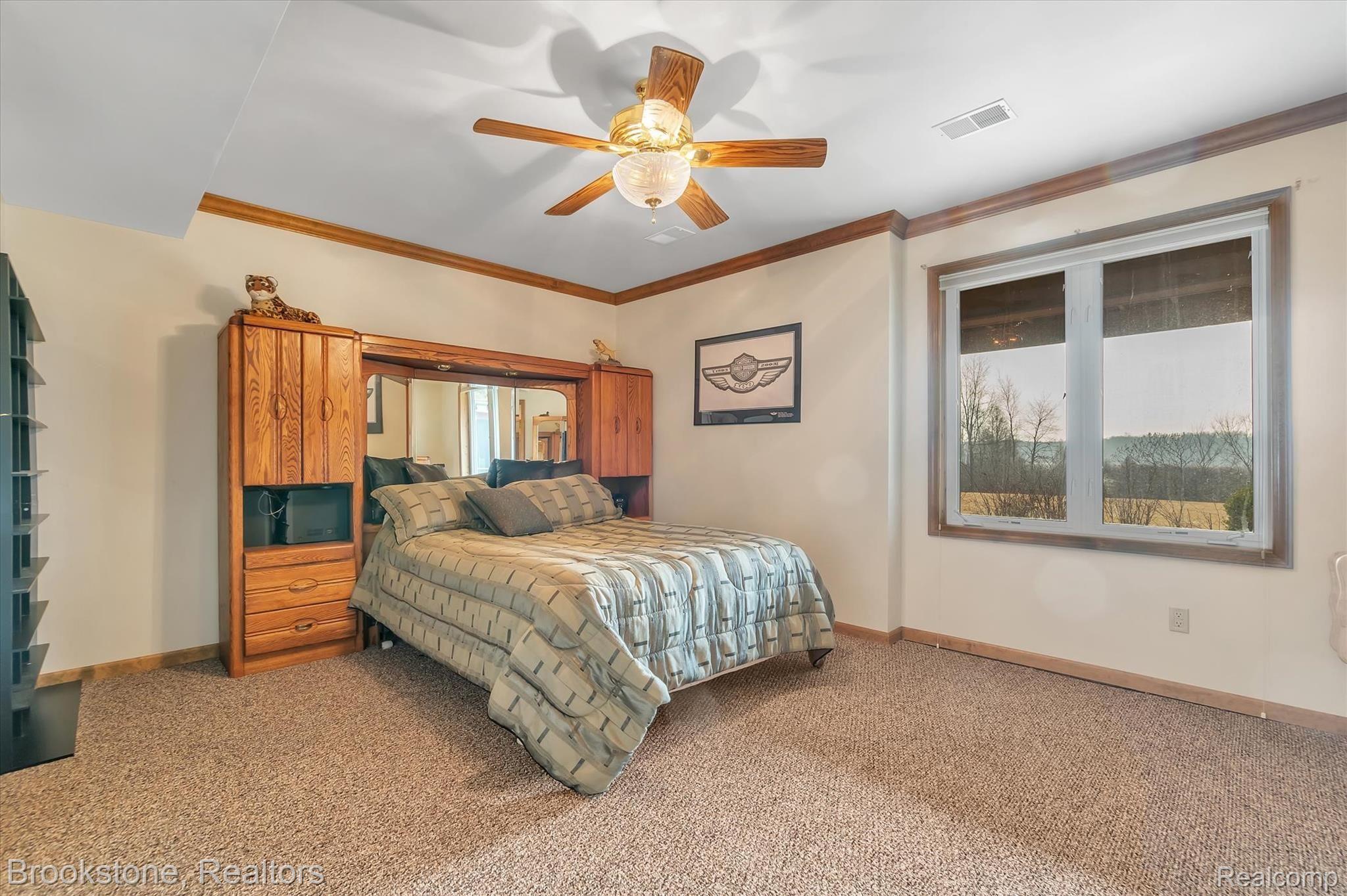 7474 Bennett Lake Road Fenton, MI 48430 - Photo 26 of 40 Lower level bedroom!