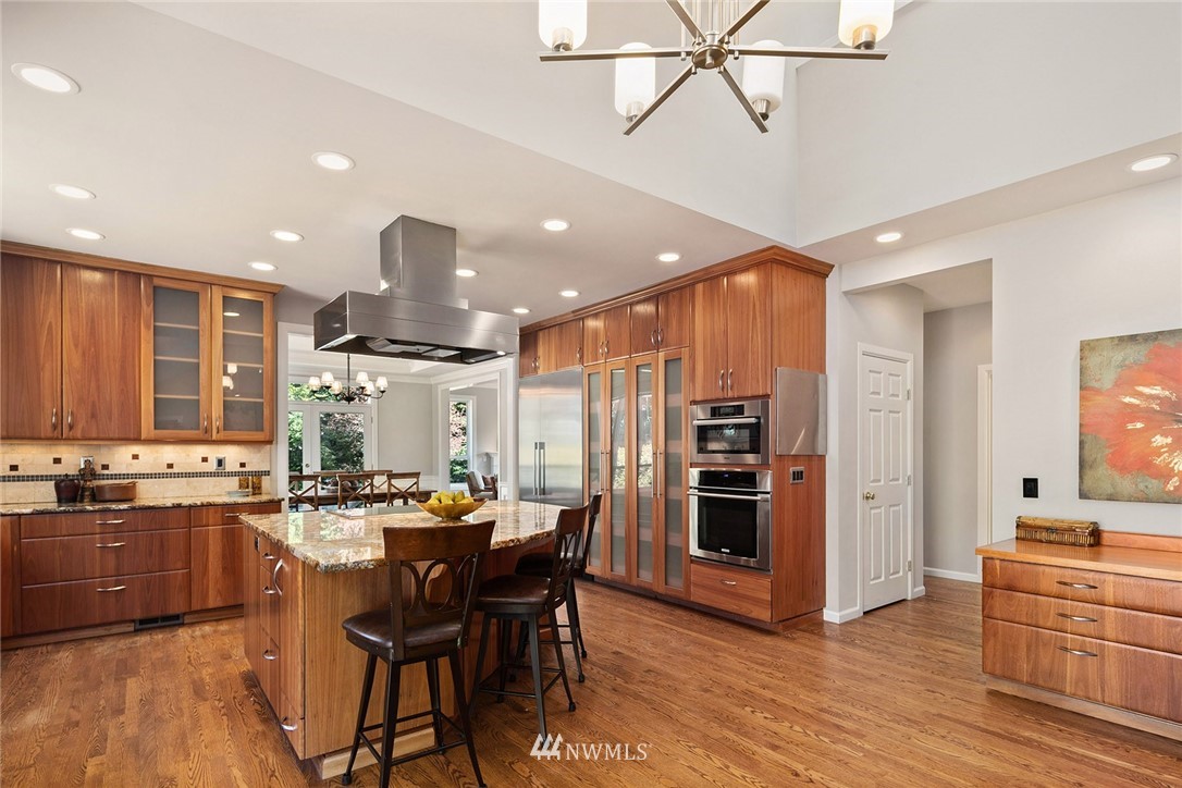 2009 Lyons Avenue Northeast Renton, WA 98059 - Photo 13 of 35 a large kitchen with a table and chairs