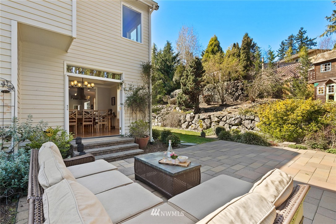 2009 Lyons Avenue Northeast Renton, WA 98059 - Photo 20 of 35 a view of a patio with couches table and chairs and potted plants