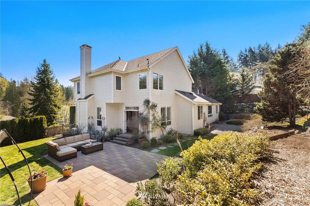 2009 Lyons Avenue Northeast Renton, WA 98059 - Photo 21 of 35 a view of a white house with a yard