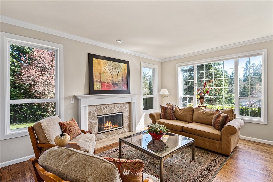 2009 Lyons Avenue Northeast Renton, WA 98059 - Photo 22 of 35 a living room with furniture and a fireplace