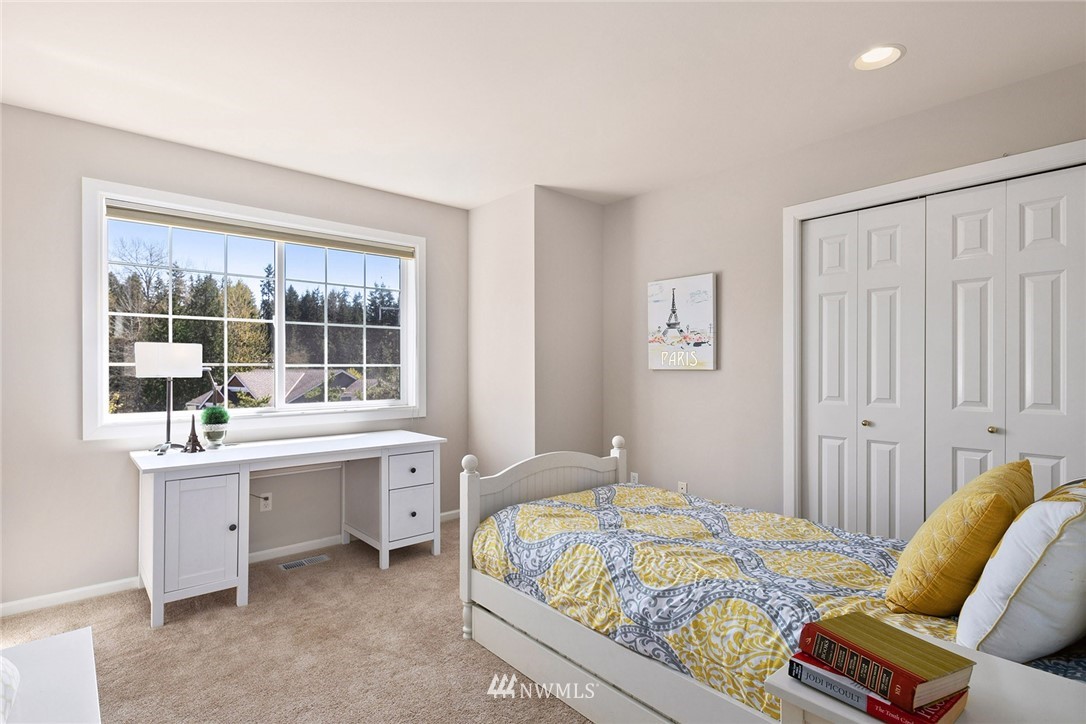 2009 Lyons Avenue Northeast Renton, WA 98059 - Photo 28 of 35 a bedroom with a bed and window
